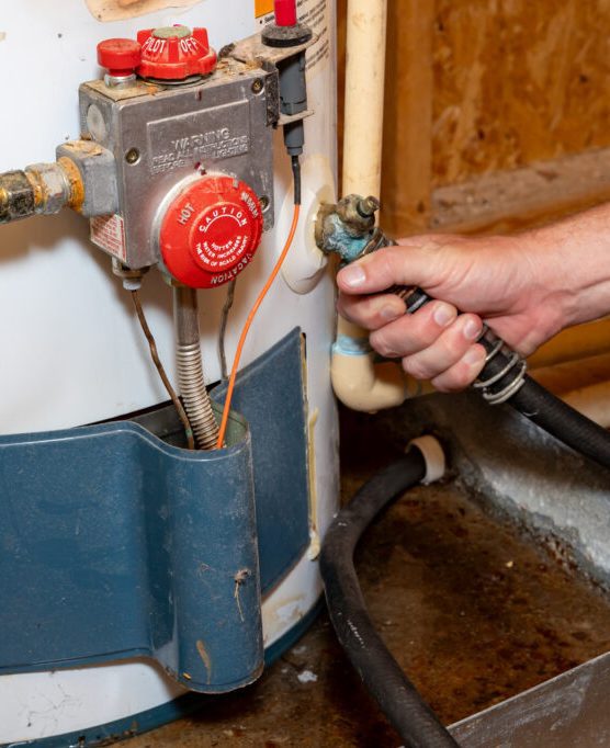 Water draining from a water heater during a flush